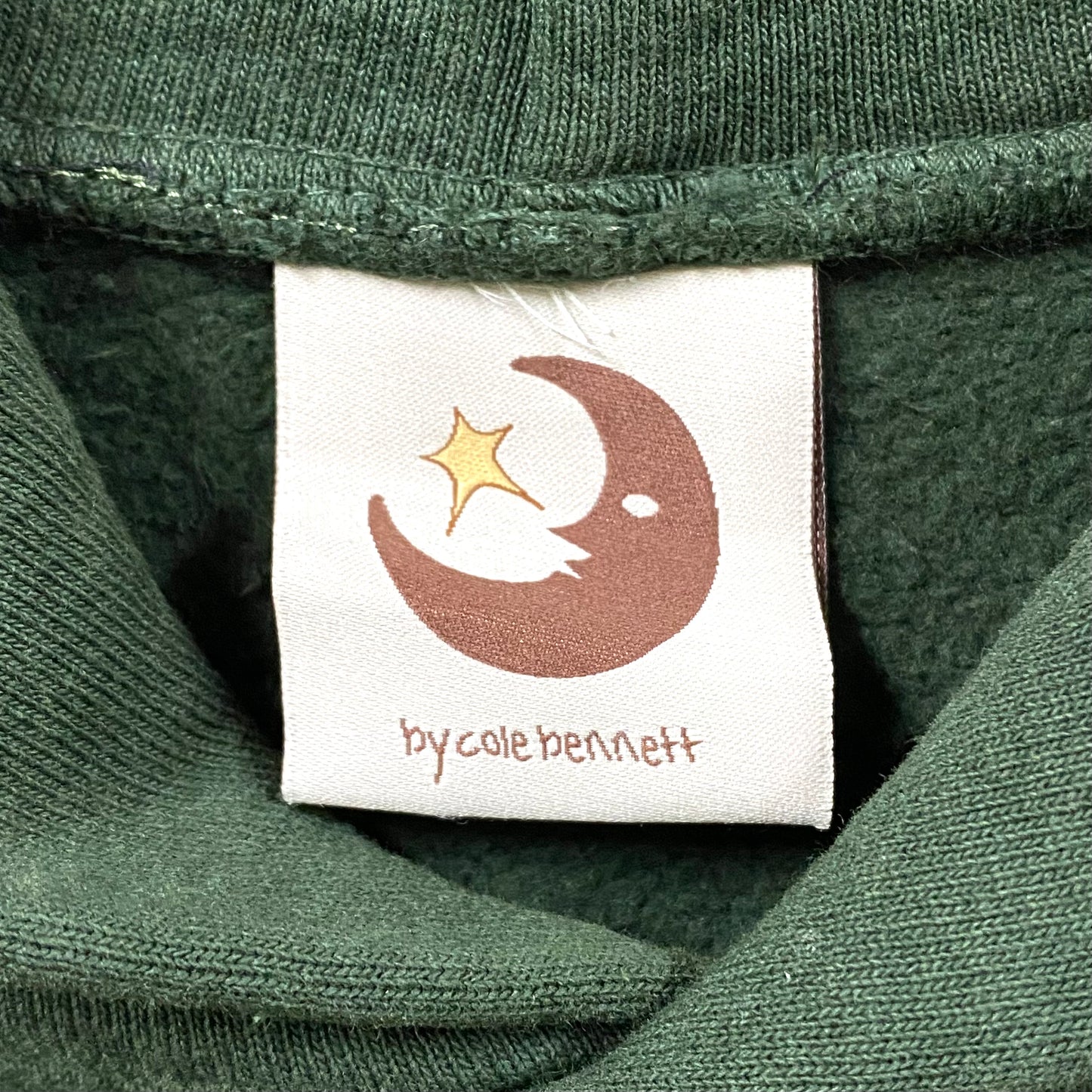 2023 by cole bennett crescent moon forest green hoodie